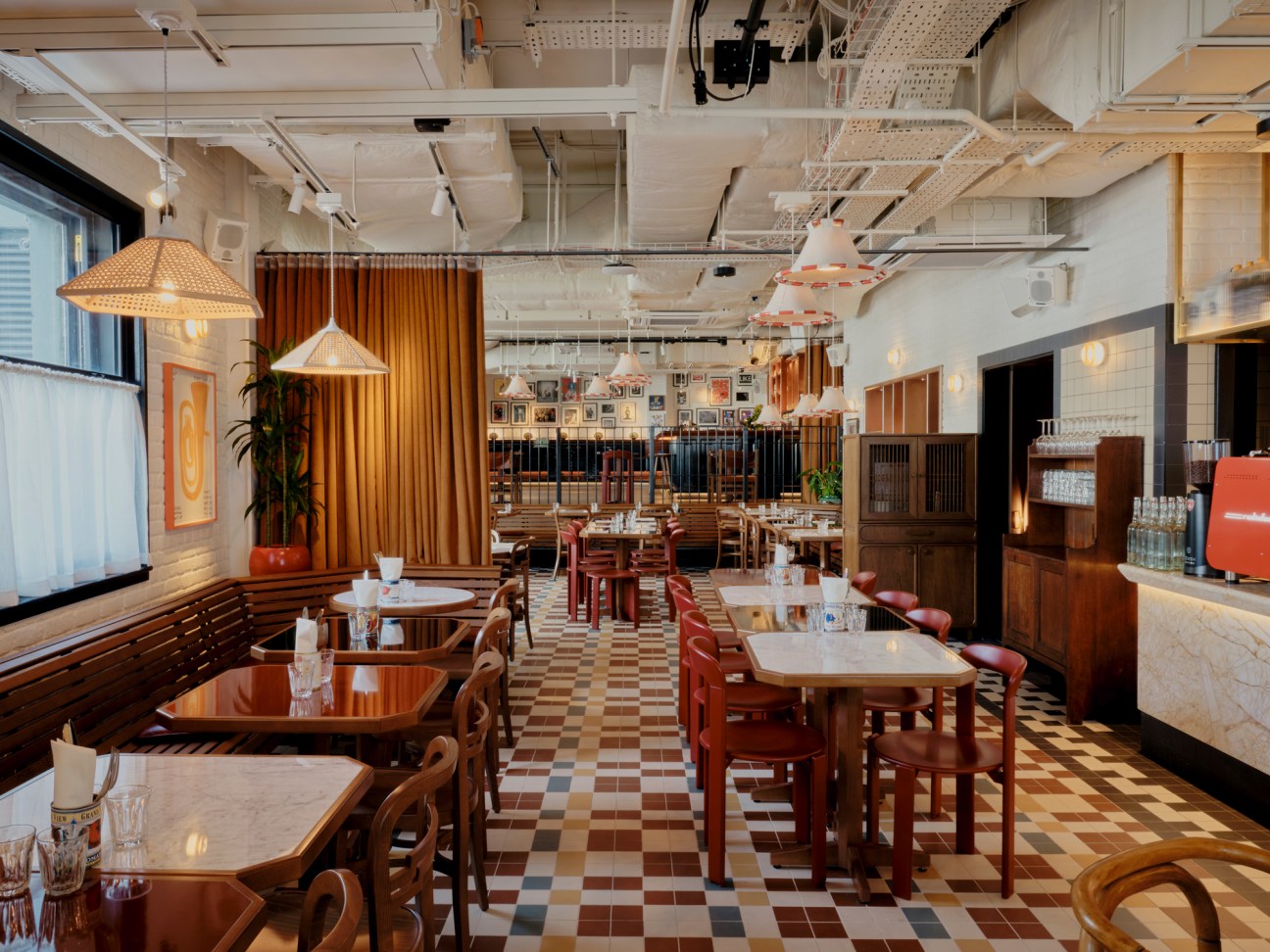 Interior of Café Koko showing modern seating areas with warm lighting and contemporary design