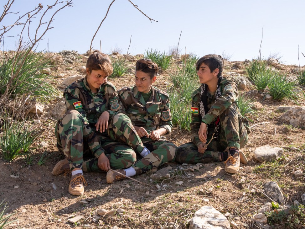 Young Kurdish fighters who recently joined after participating in Iranian protests