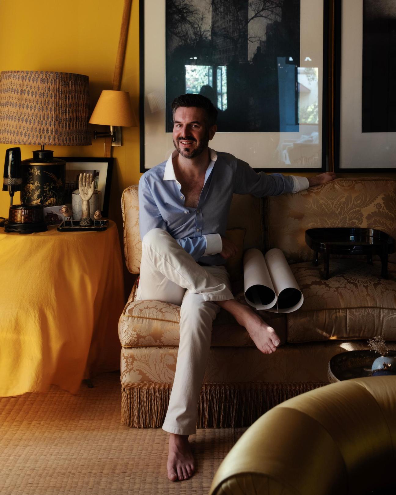 Cormac Lynch sitting on a sofa