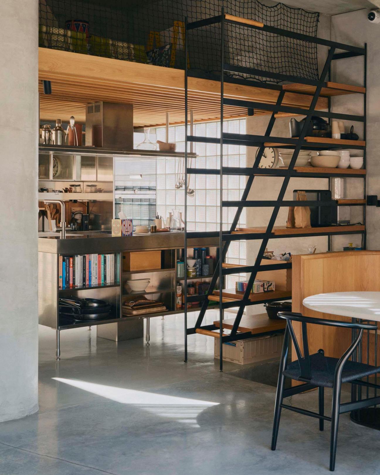 Children's mezzanine play space and custom stair-shelving system