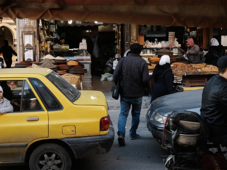 Syria, Damascus, 2025. A girl looks out from the car window in Milan Jazmetieh district in Damascus.