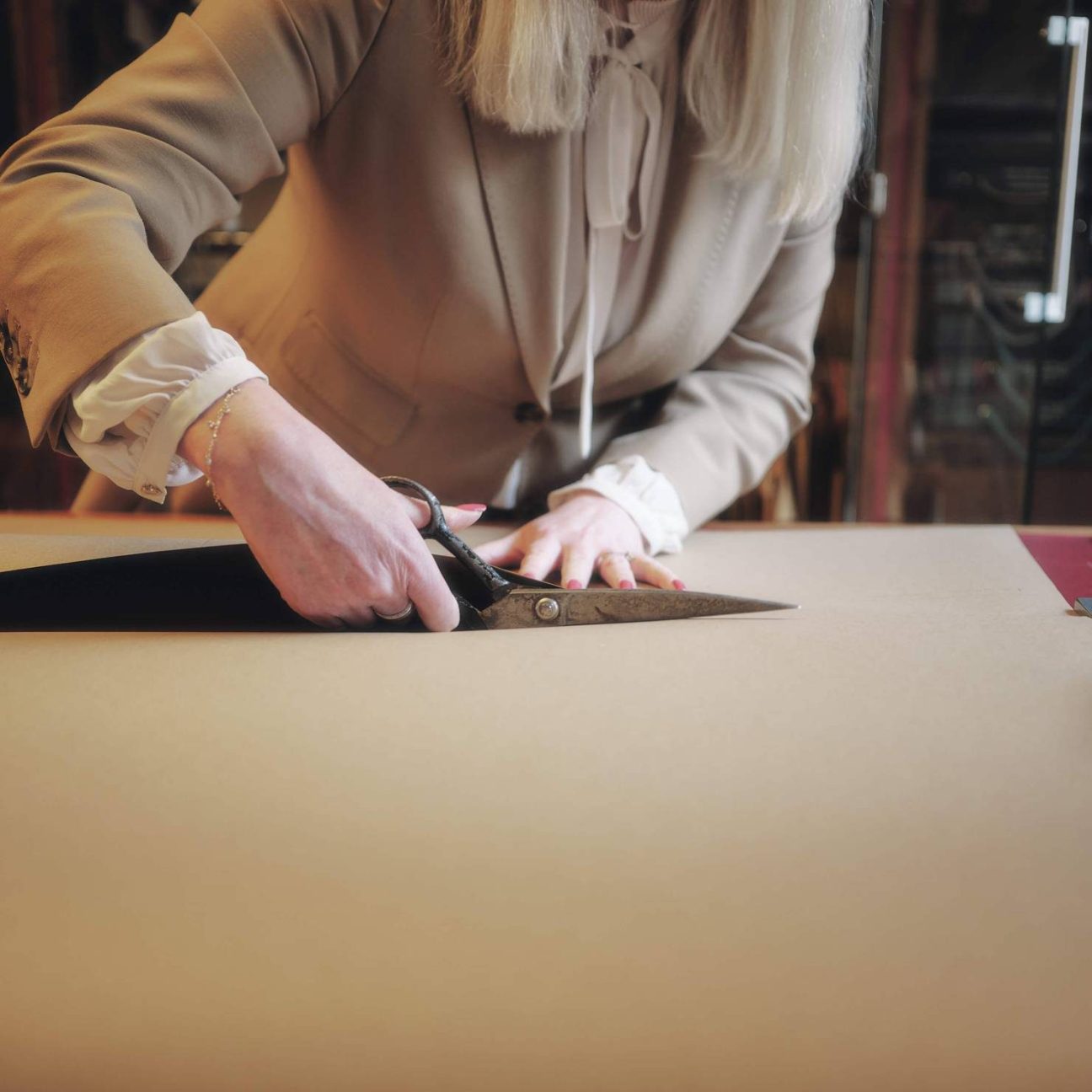 Kathryn Sargent cutting fabric.