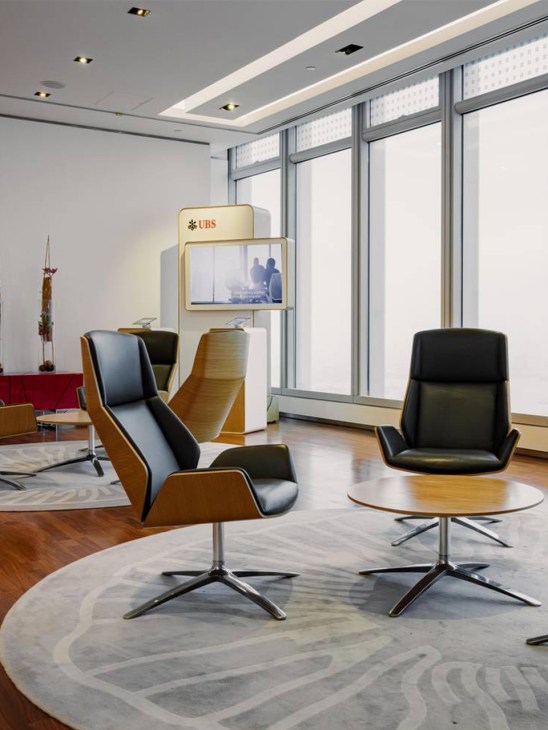 A portrait of a lounge area in the UBS office.