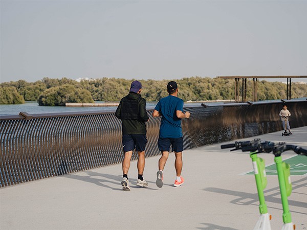 Men running in Abu Dhabi.