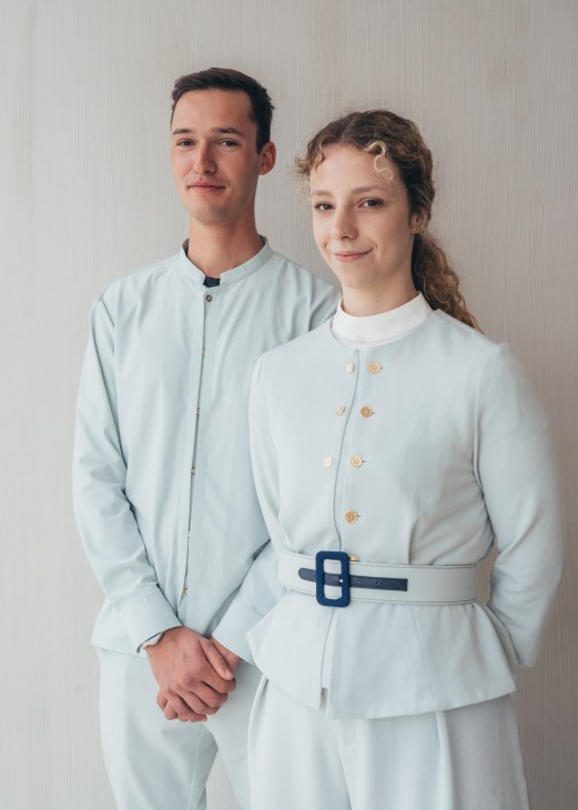hotel staff dressed in white