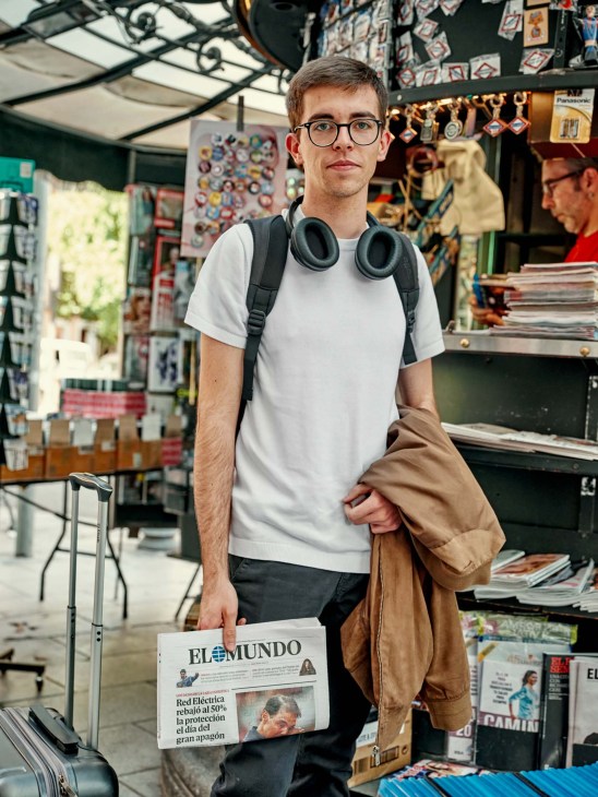 Man holding newspaper