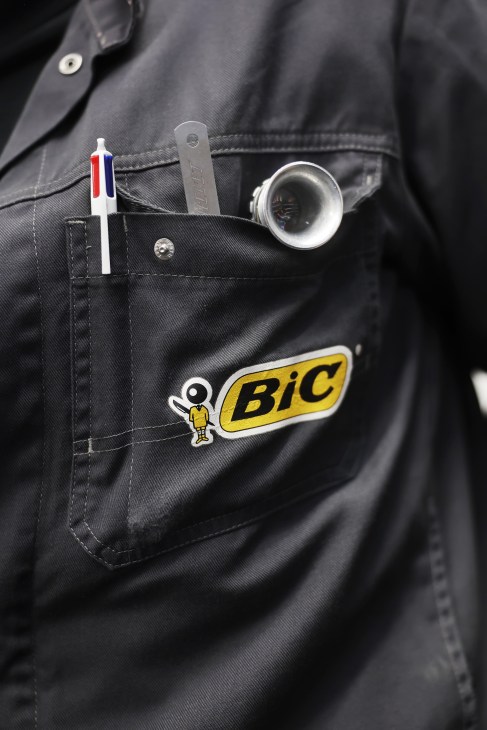 A bic pen in a worker's pocket