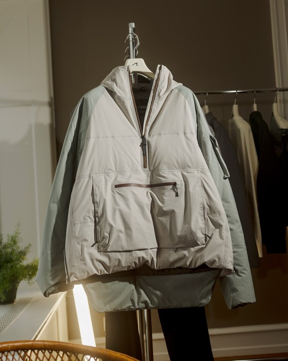Grey Sakata jacket on a hanger