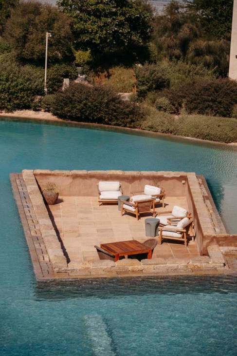 Patio and sunloungers at at The Outpost Al Barari, Qatar