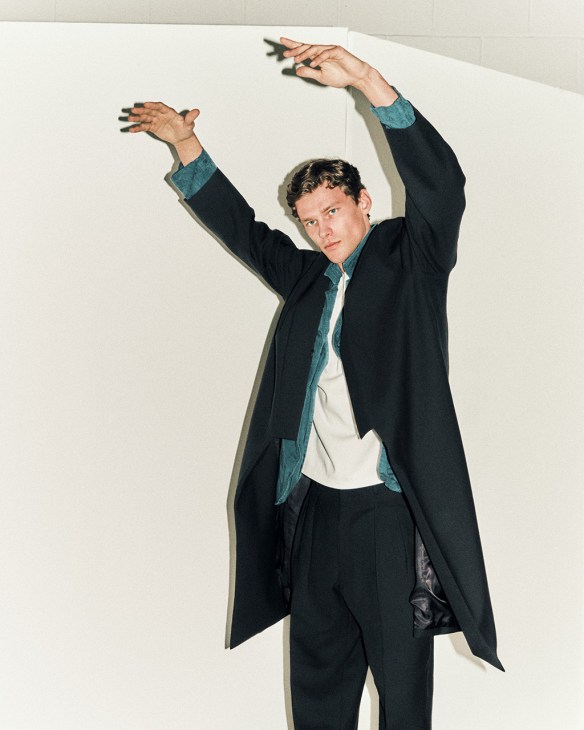 Model in a coat by Rainmaker
