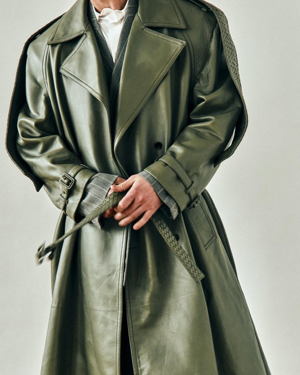 Model wearing a bottle green Botega Veneta coat