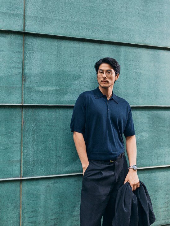 Polo shirt by John Smedley X Bill Nighy, jacket and trousers by Giorgio Armani, glasses by Lindberg, belt by J&M Davidson, Constellation Observatory watch by Omega