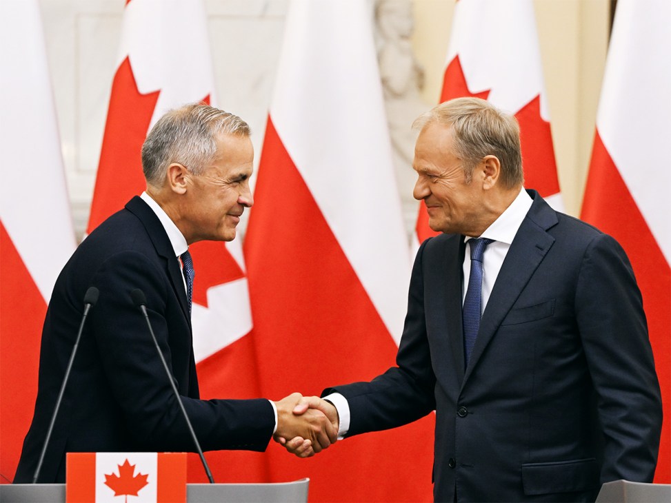 Donald Tusk (on right) and Mark Carney