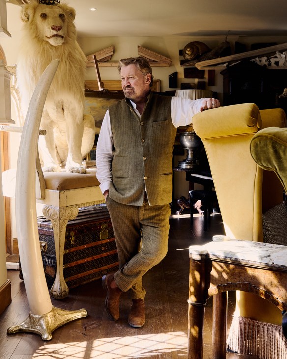 Antiquities collector James Perkins with some of his collection, including a stuffed lion