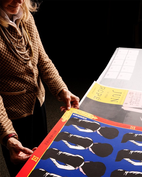 Susan Reinhold showing some of her posters