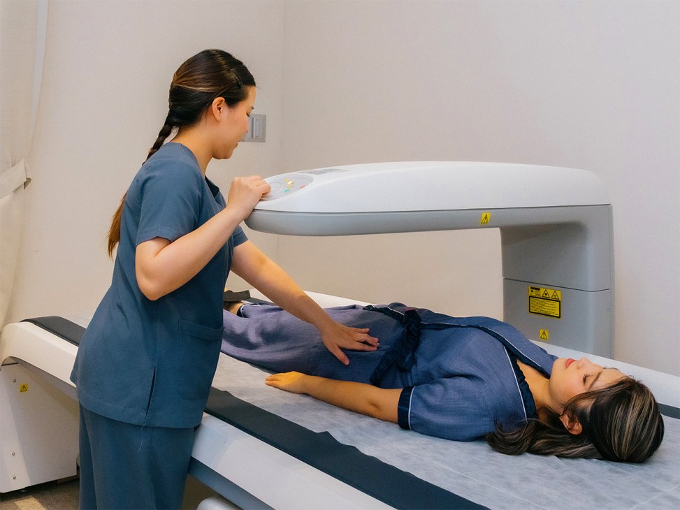 A patient and staff member at BDMS Wellness Clinic in Bangkok