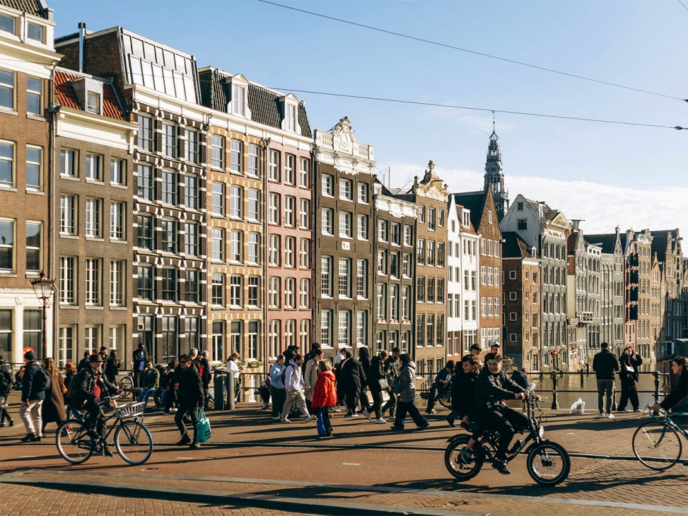 Cyclists and pedestrians near Amsterdam Centraal Station, Netherlands