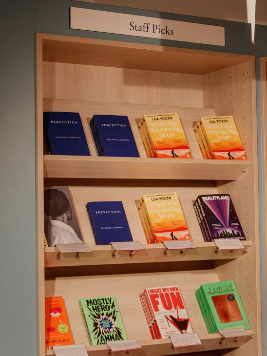 Books on shelves at Scheltema bookshop in Amsterdam