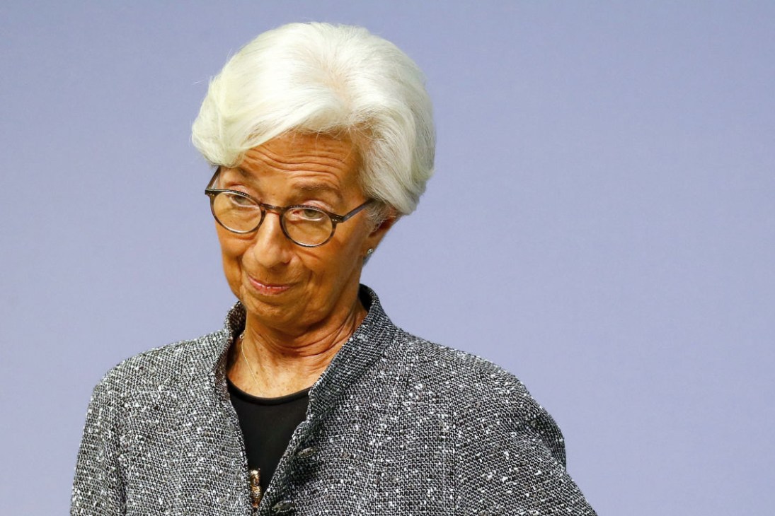 Portrait of Christine Lagarde, president of the European Central Bank, wearing glasses and a grey jacket.