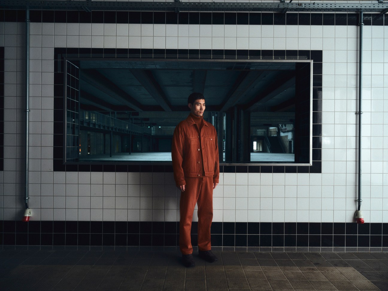 Model wearing Stone Island's gabardine jacket