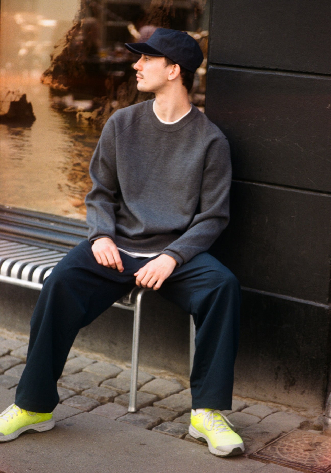 Well-dressed staff members at Norse Projects Copenhagen store displaying the brand's aesthetic