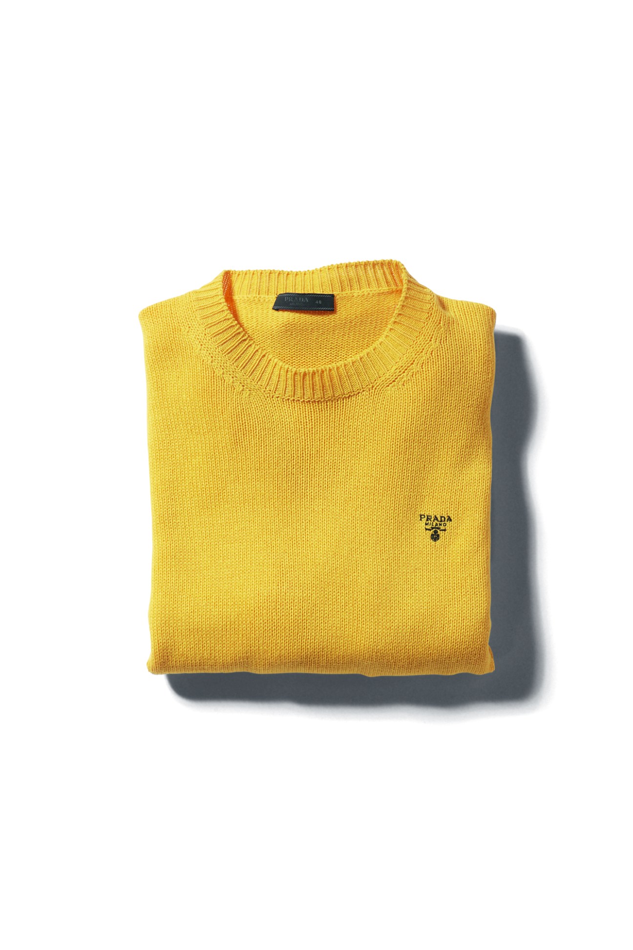 Yellow knit jumper by Prada with ribbed crew neck and small logo on chest