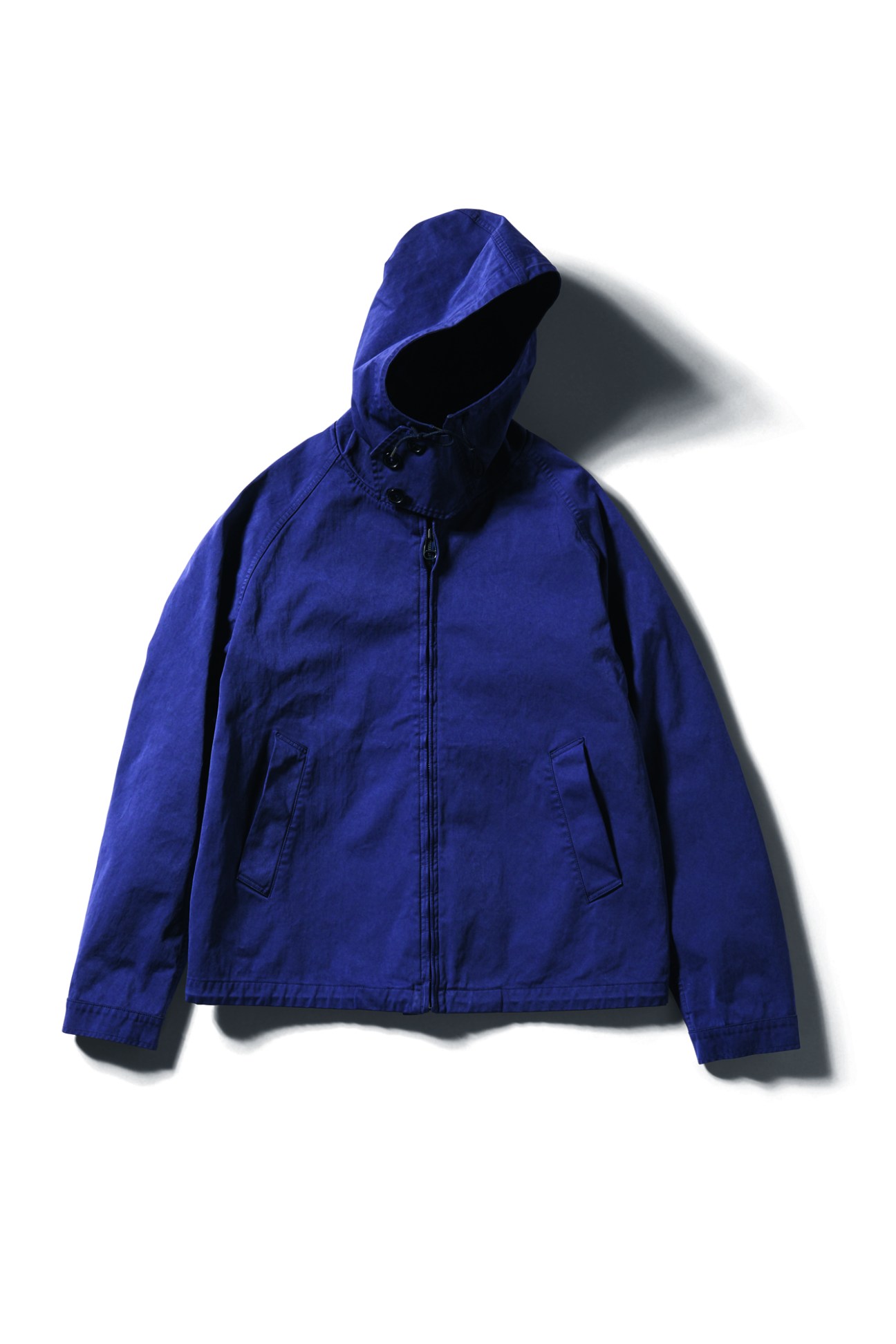 Blue hooded parka jacket by Ten C displayed against white background