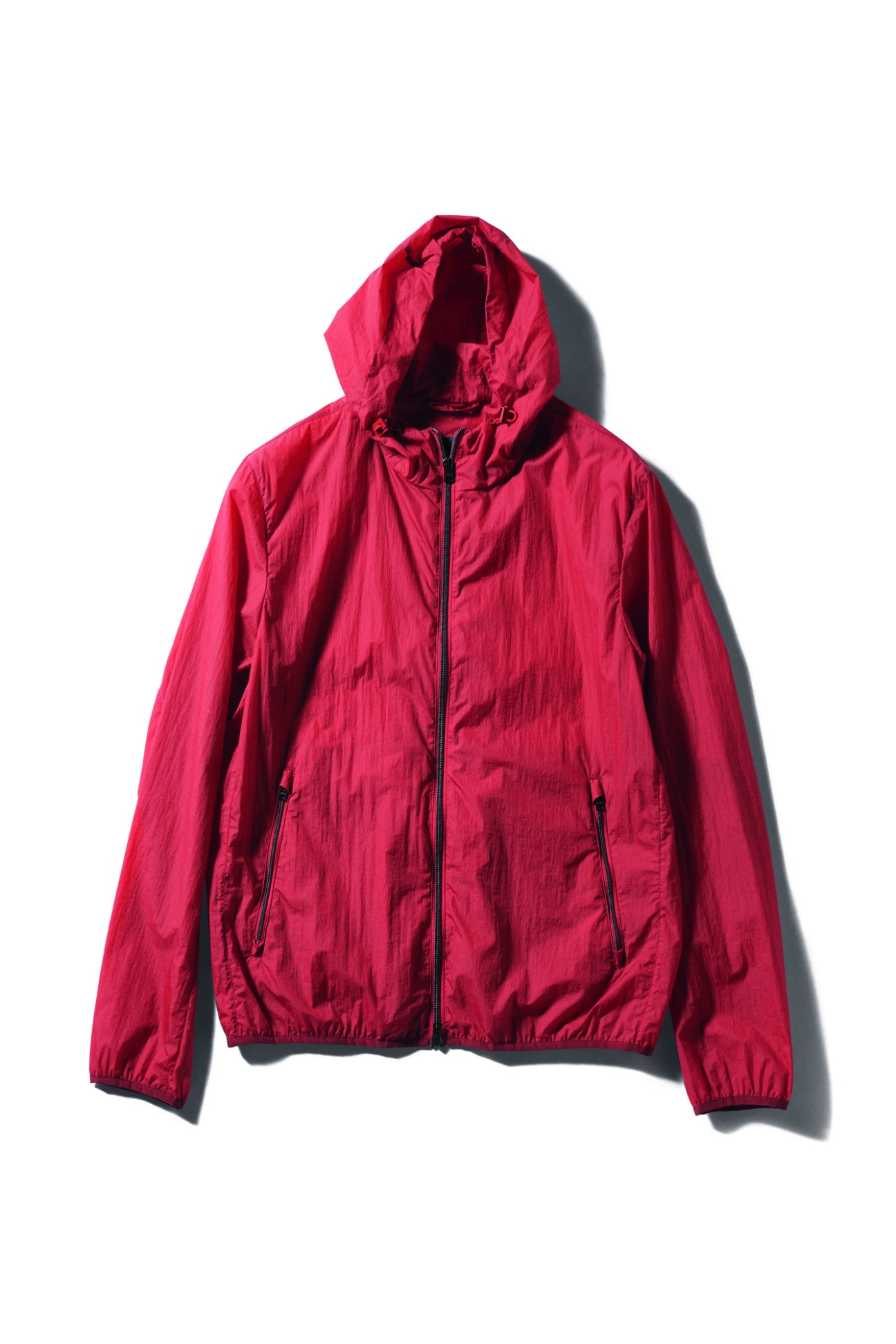 Red hooded parka jacket with full zip closure and side pockets by Herno