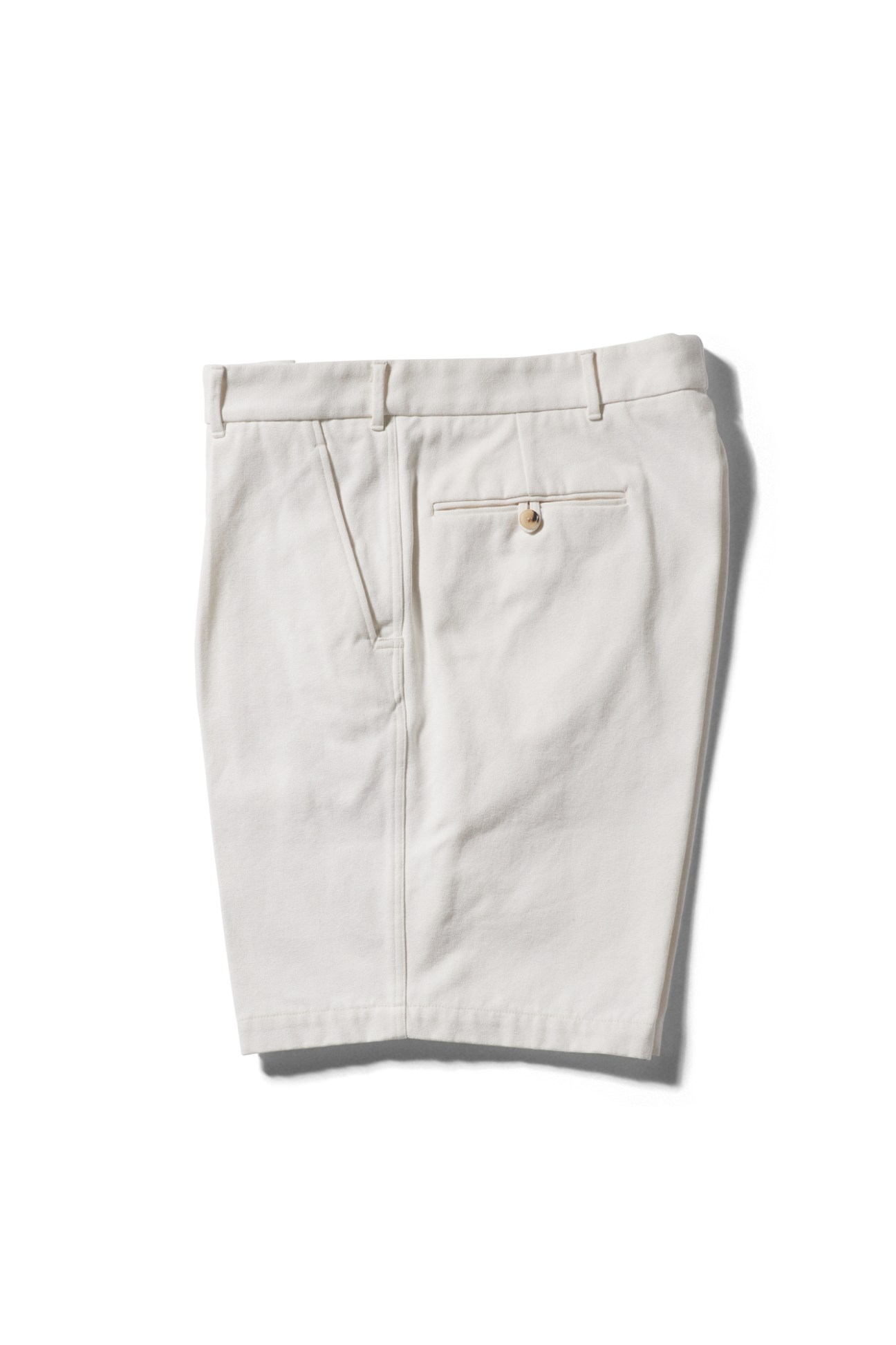Light gray tailored shorts with button closure and back pocket by Heugn