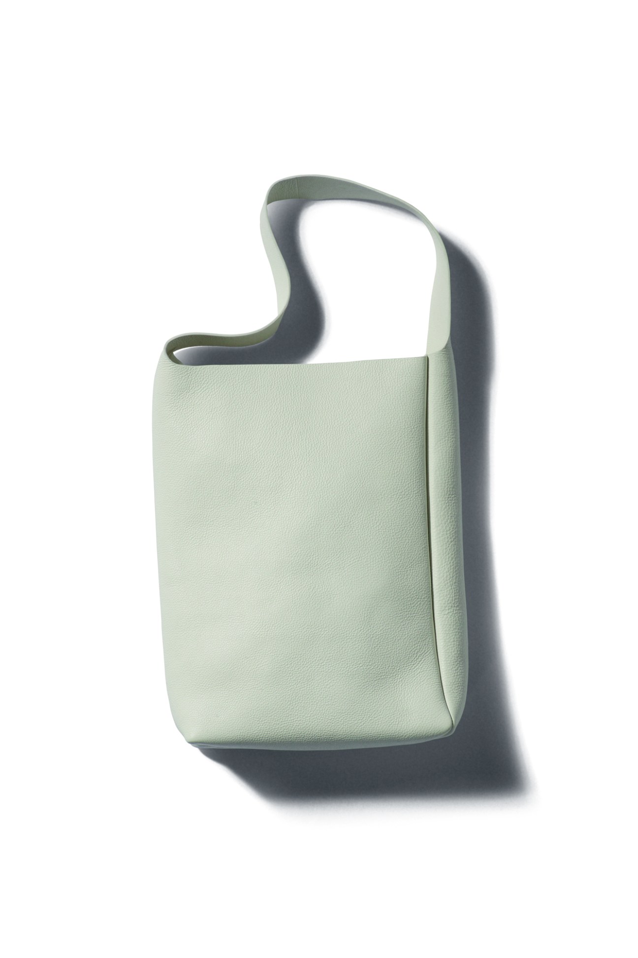 Sage green leather hobo bag with curved shoulder strap by Aeta