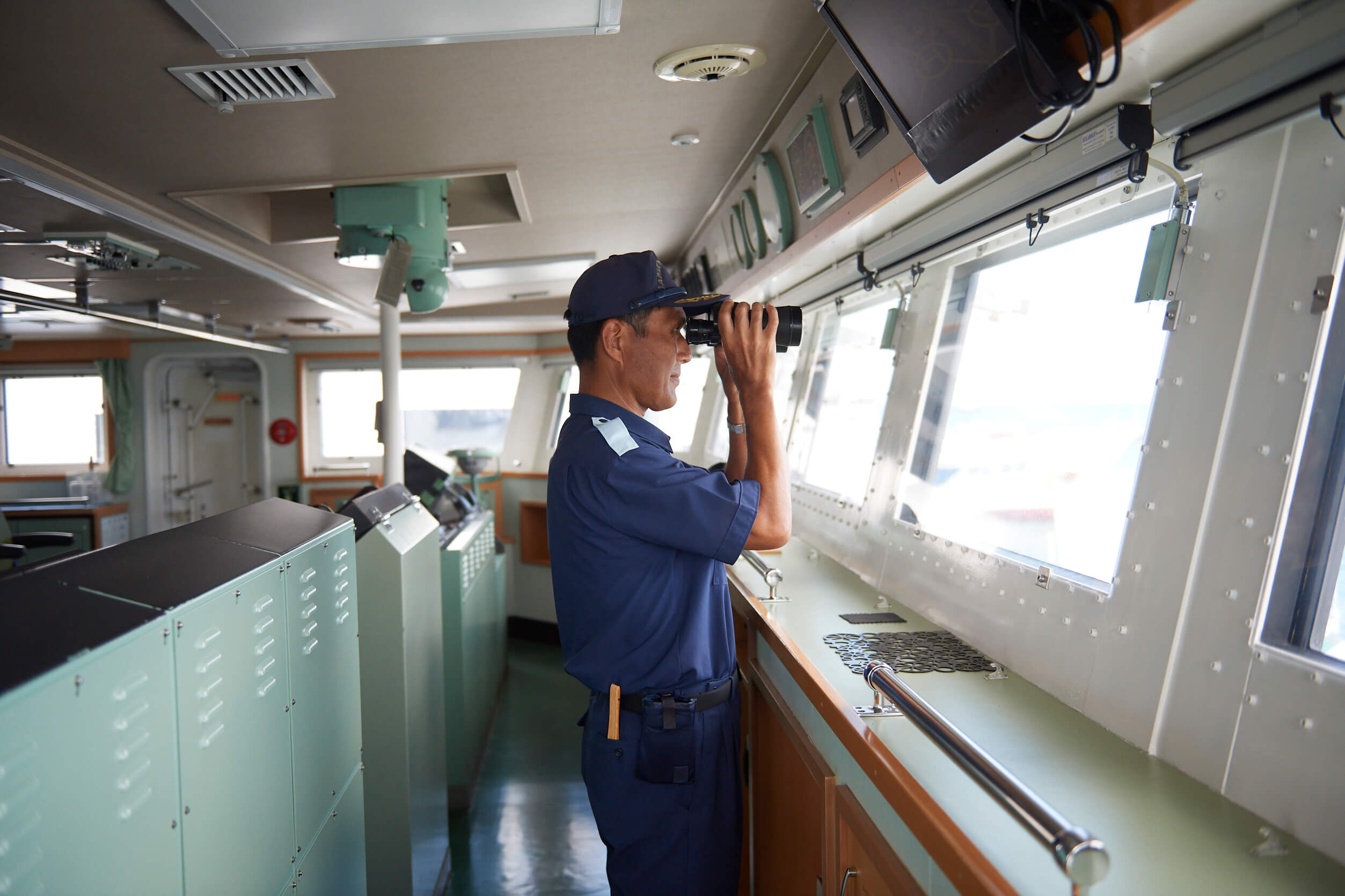 Commanding officer Captain Yoshitaka Morimoto on the lookout