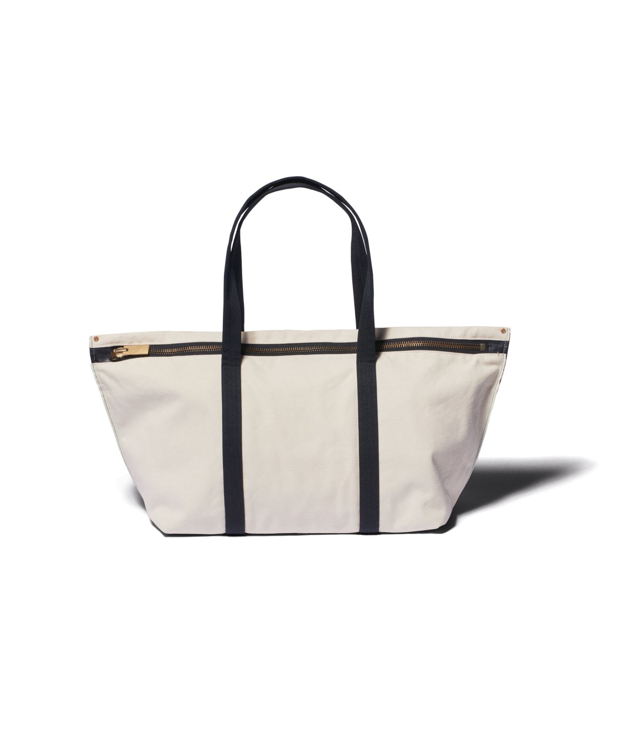 Beige canvas tote bag with black handles and trim by Texnh