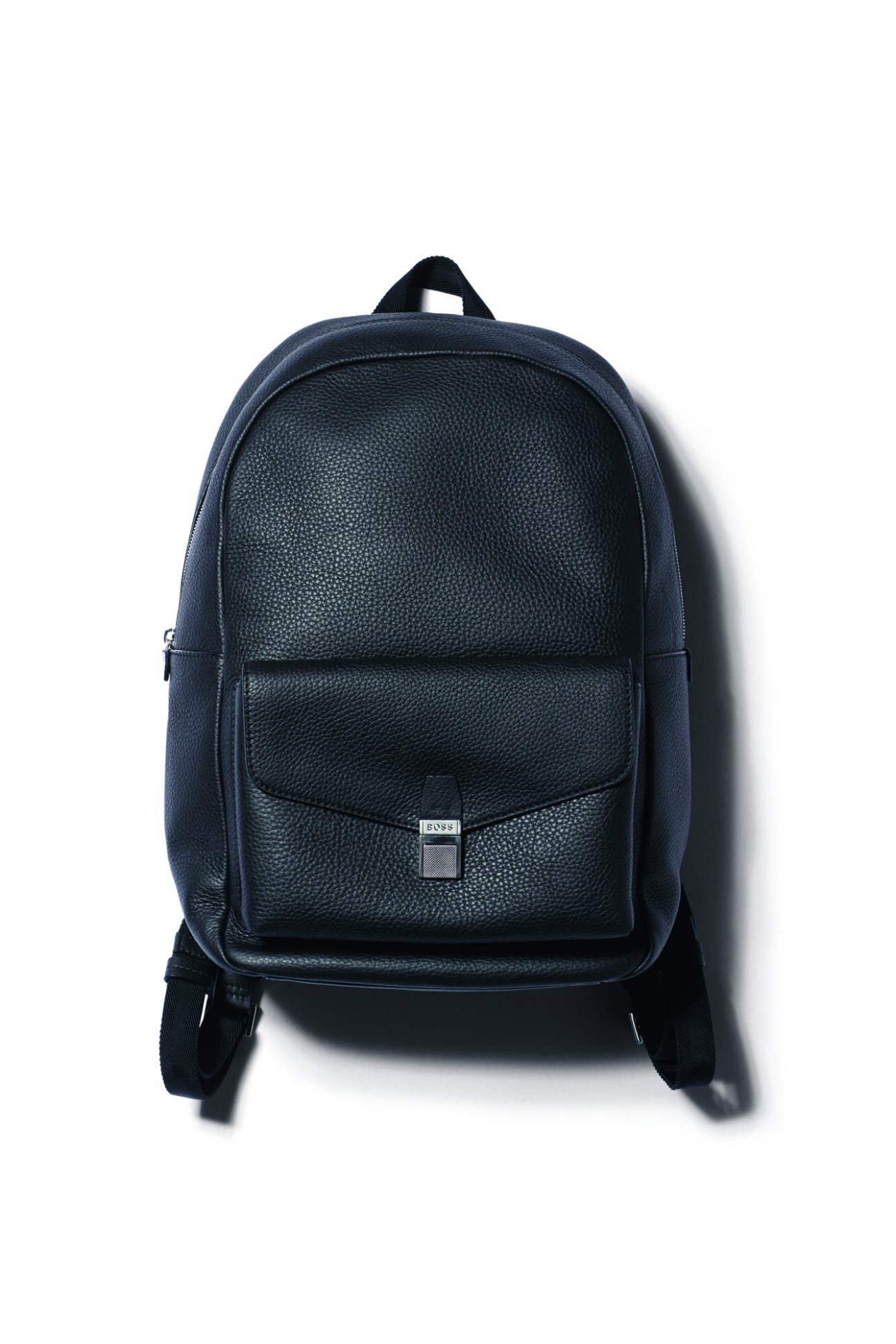 Black leather backpack by Boss with textured surface and front pocket with metal clasp closure