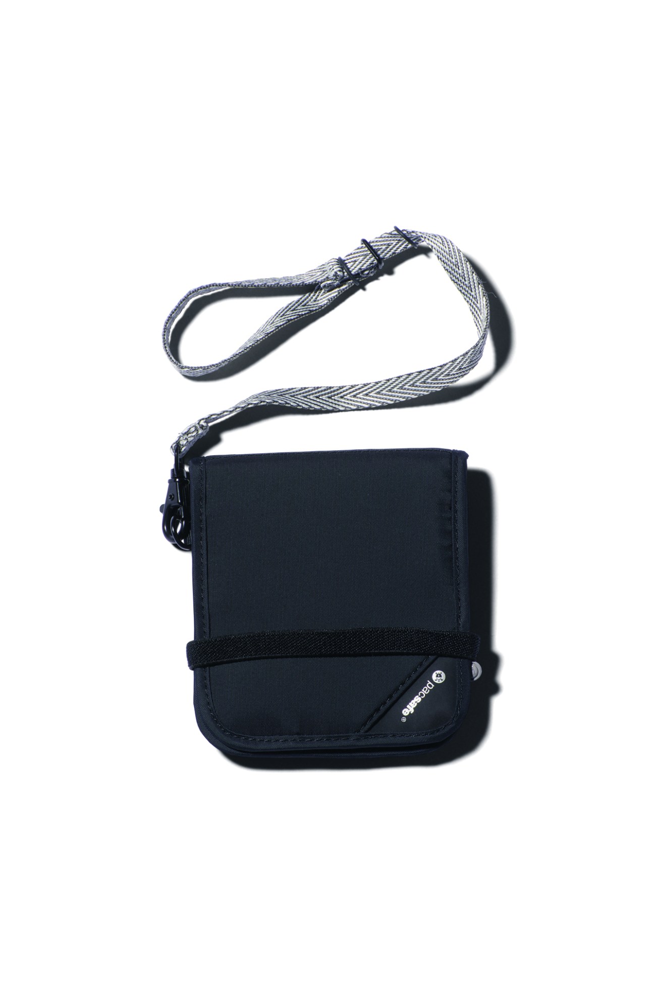 Navy crossbody bag with adjustable gray strap and front pocket by Pacsafe from A&F