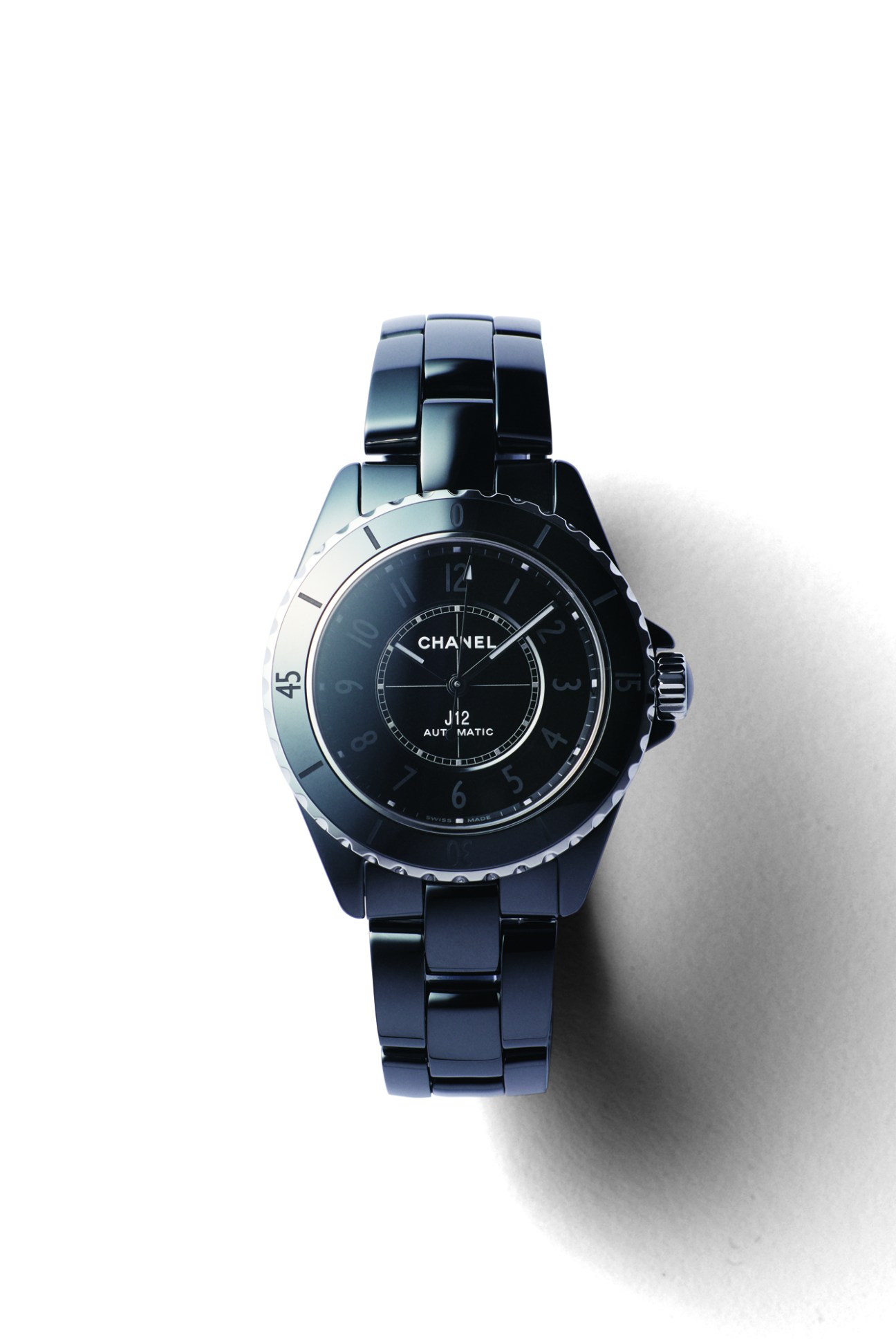 Black Chanel J12 Phantom watch with ceramic bracelet and black dial on white background