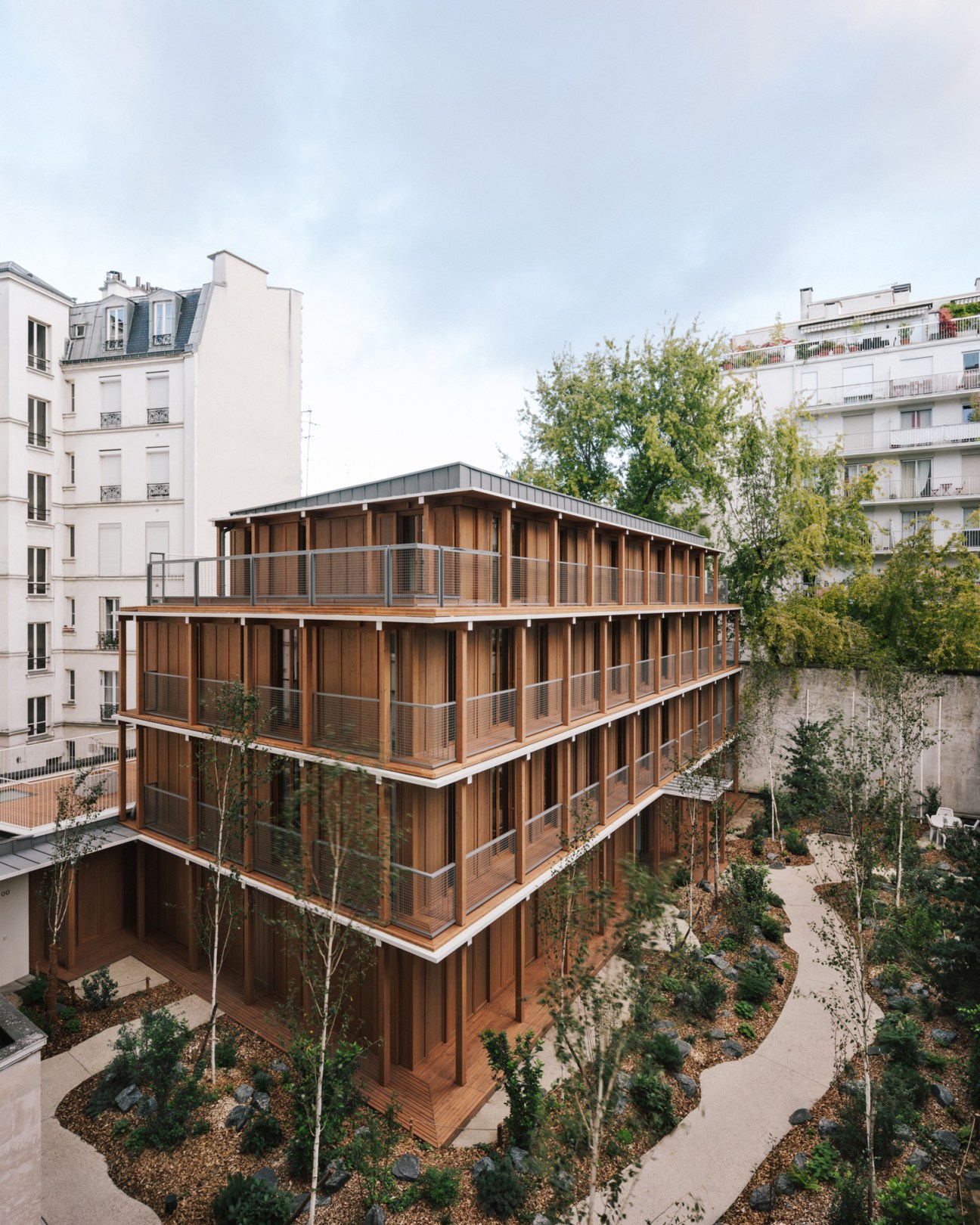 Exterior view of 14 Accommodations showing the timber construction and balconies