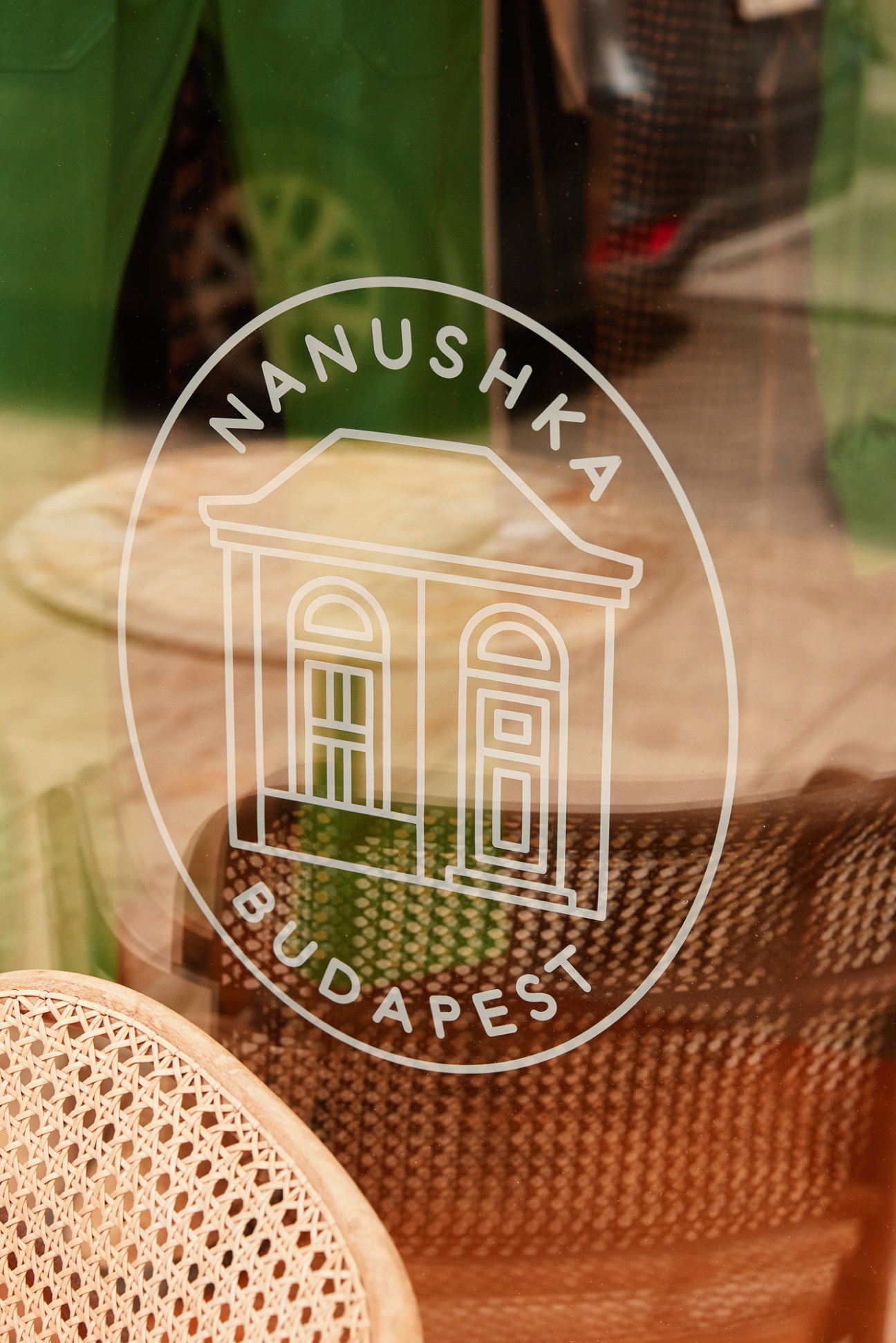Nanushka logo displayed on woven textiles and materials