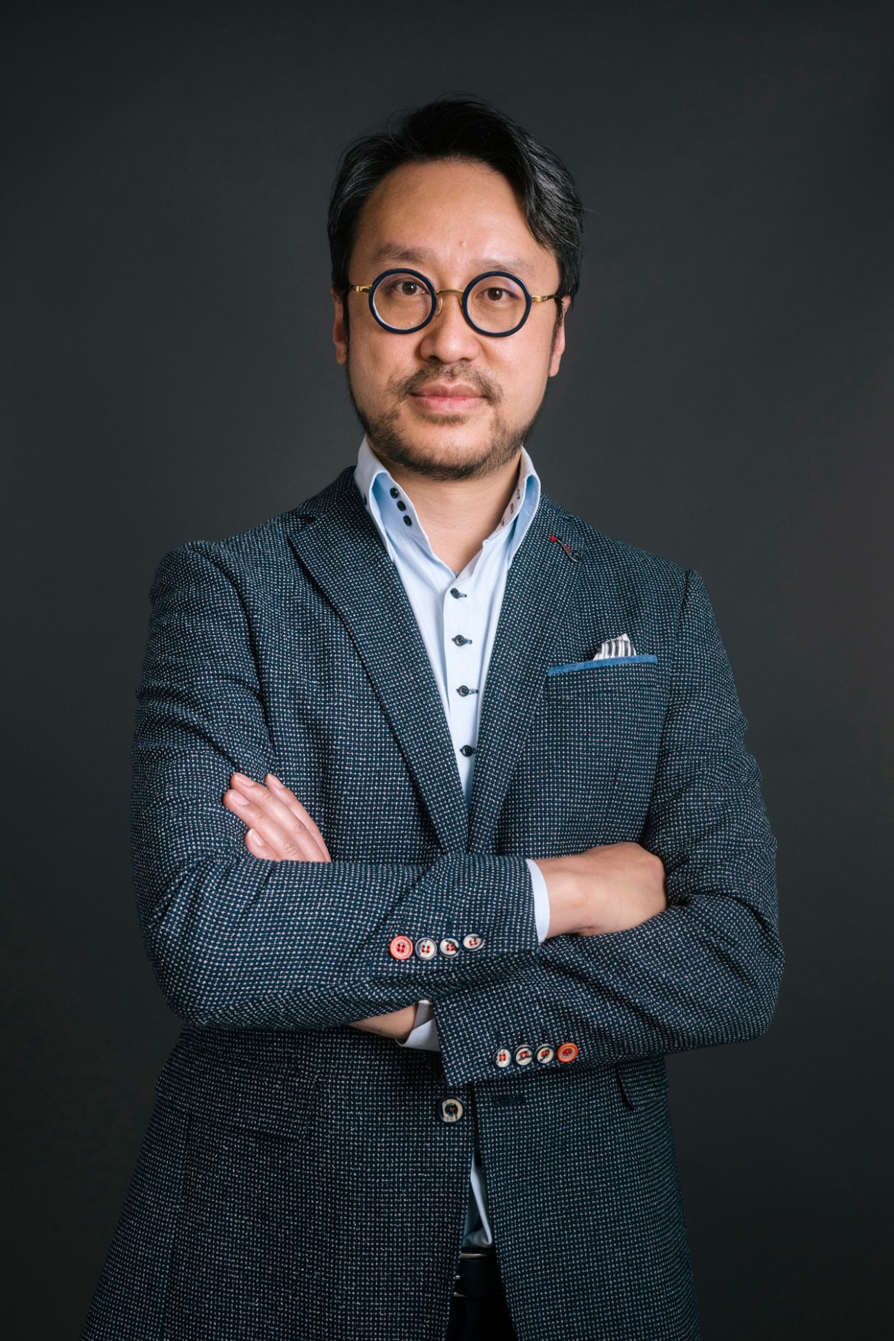Studio portrait of Chow Chung-yan, executive editor of SCMP