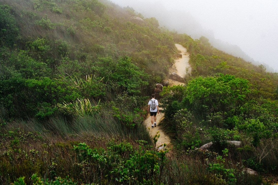 James Chambers hiking through Hong Kong mountains as part of his commute