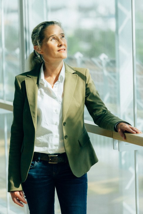 Susanne Miarka, senior vice-president of real estate at Uniper, standing by a window in business attire.