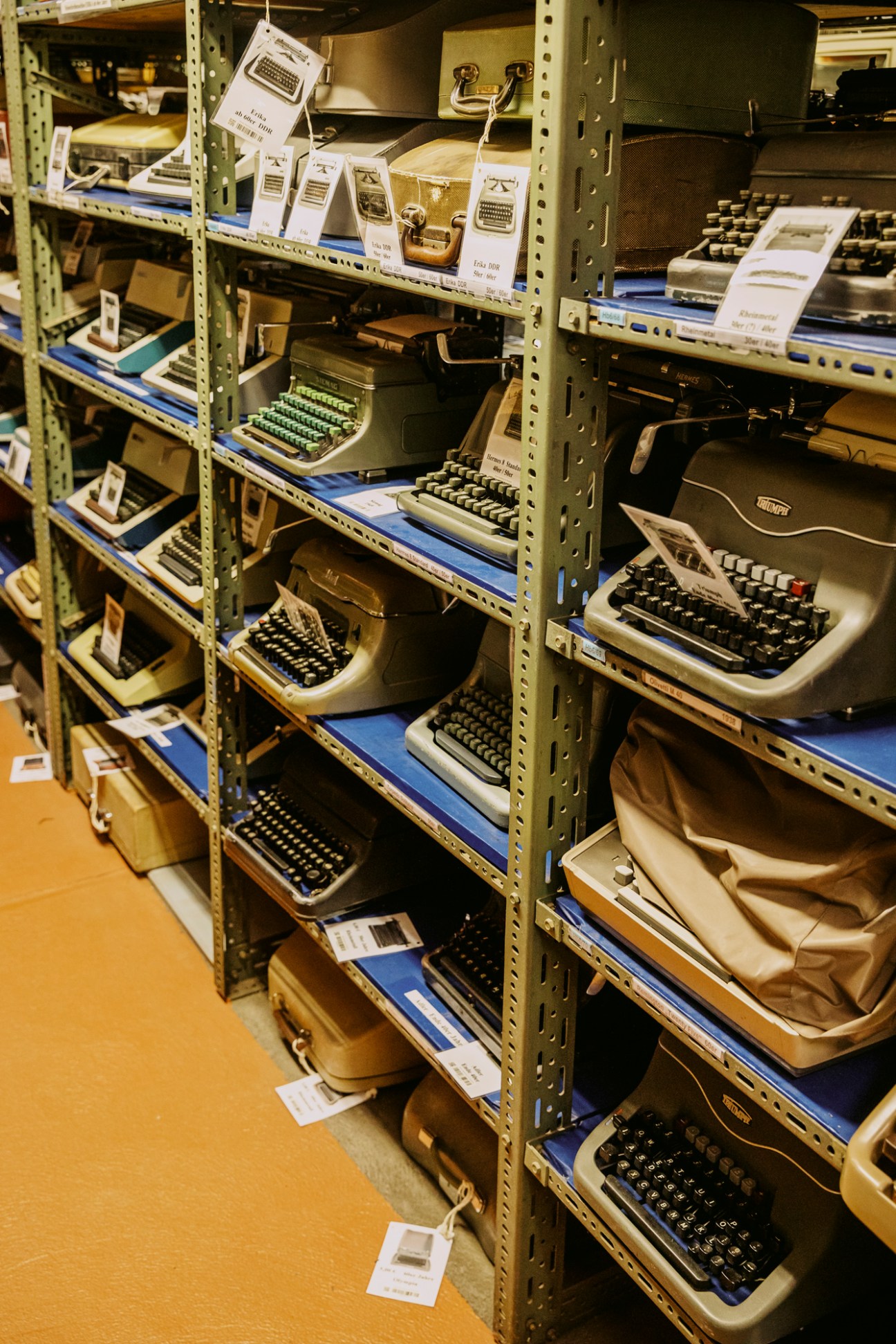 Rows of vintage typewriters arranged on shelves in Babelsberg's extensive prop store