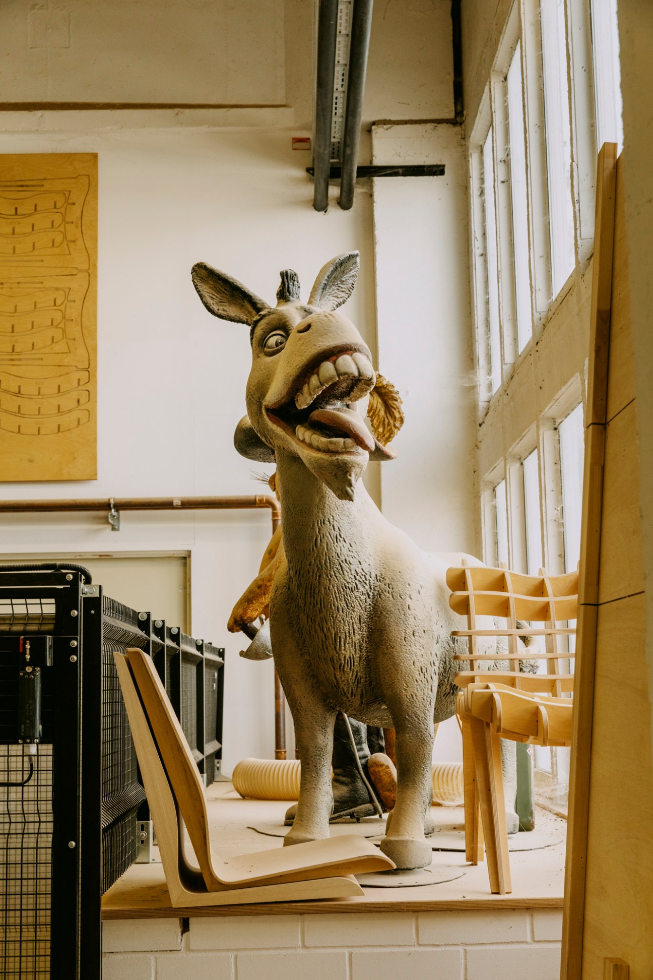 Workshop apprentice's sculpted Donkey character from Shrek displayed in Studio Babelsberg
