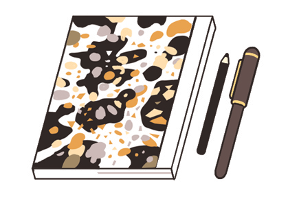 Close-up of a Nakaya Briarwood fountain pen on handcrafted notebook