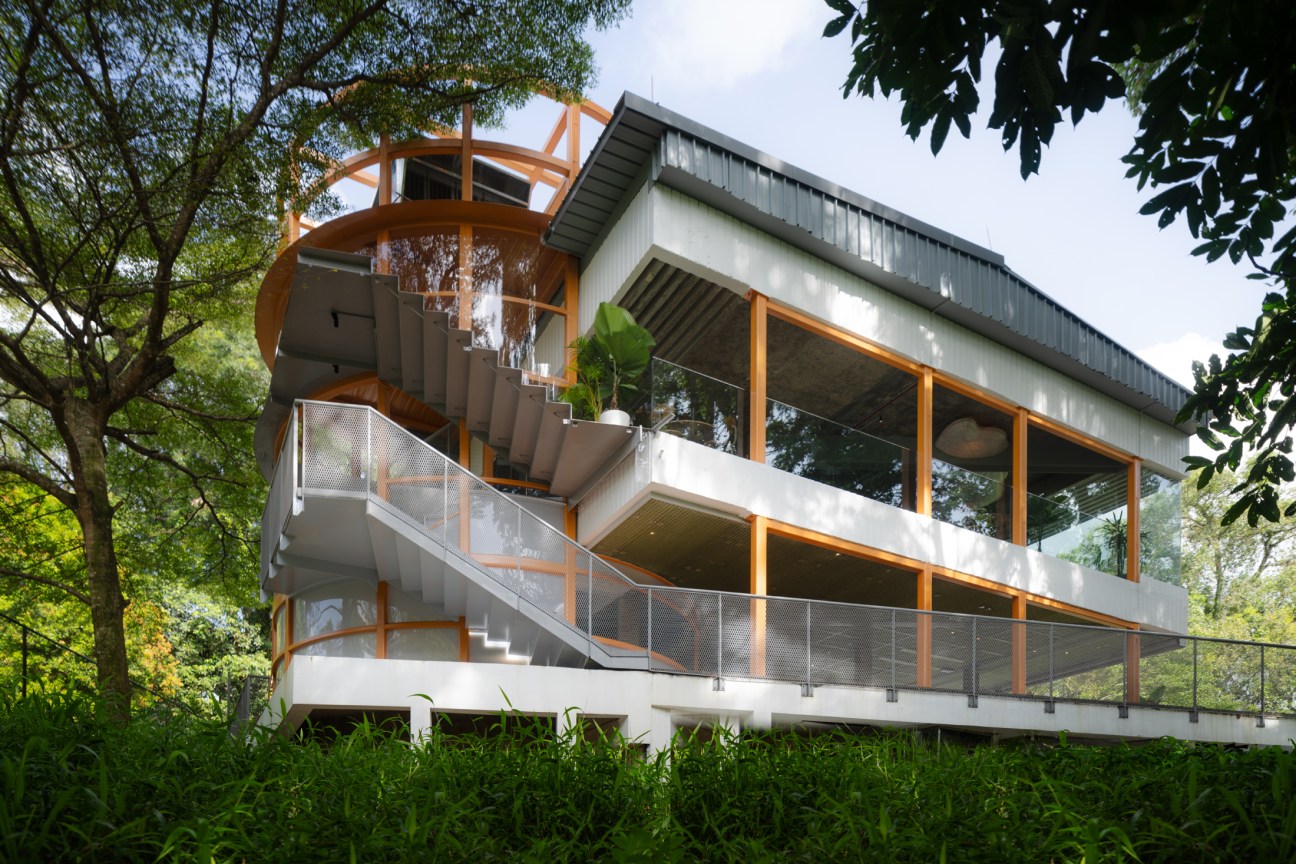 two-storey building with wooden terraced patios