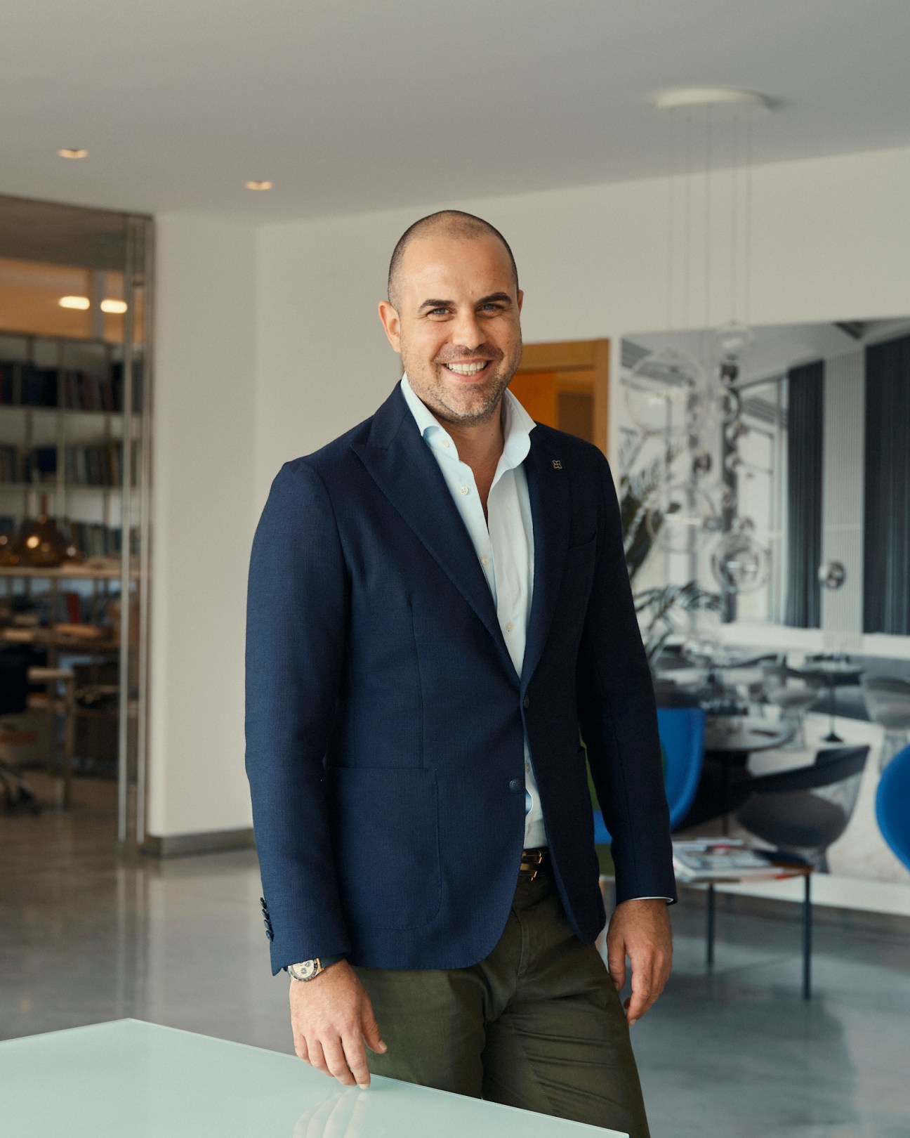 Massimiliano Tosetto, Lodes managing director, standing in modern showroom wearing navy blazer