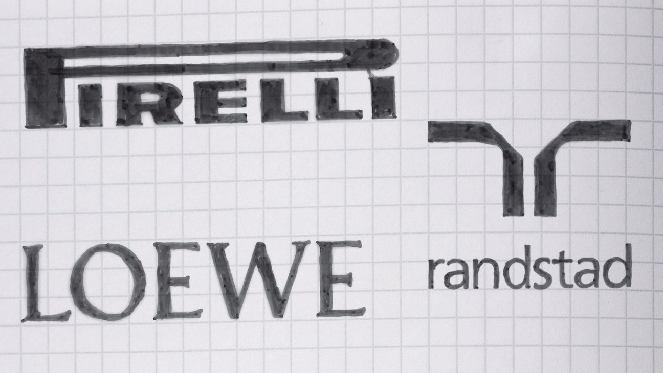 Hand-drawn logo sketches showing Pirelli and Loewe branding concepts on graph paper
