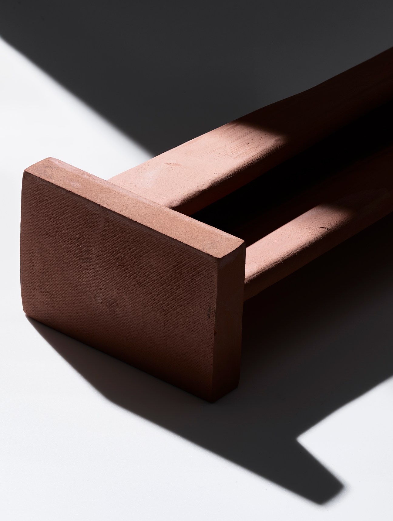 Terra terracotta sliding shutter system by Léon Félix with water tray for natural cooling