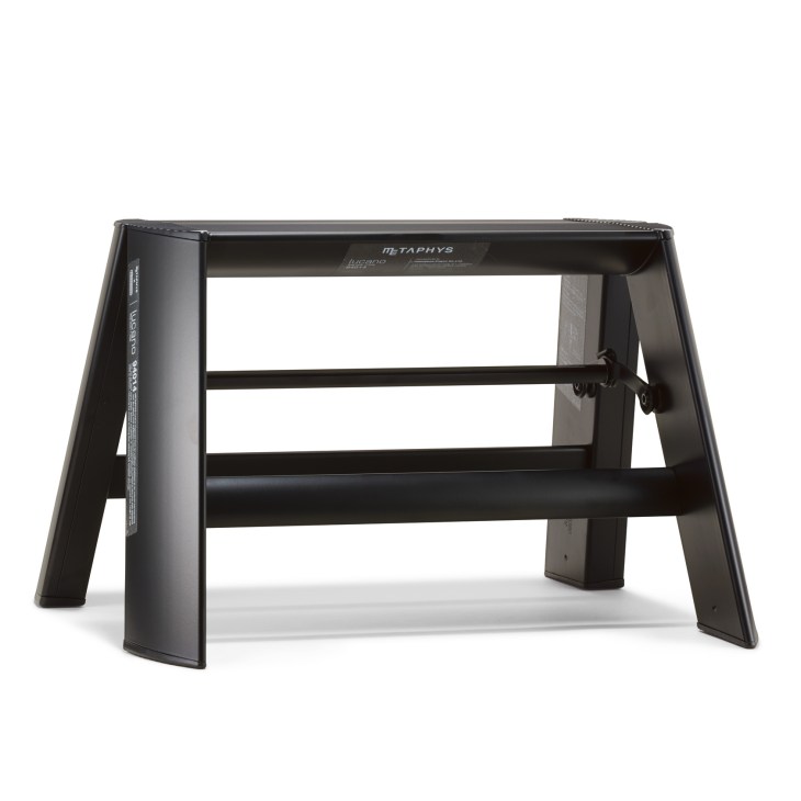 Lucano step stool by Metaphys, a black multi-functional footrest and stepladder hybrid.