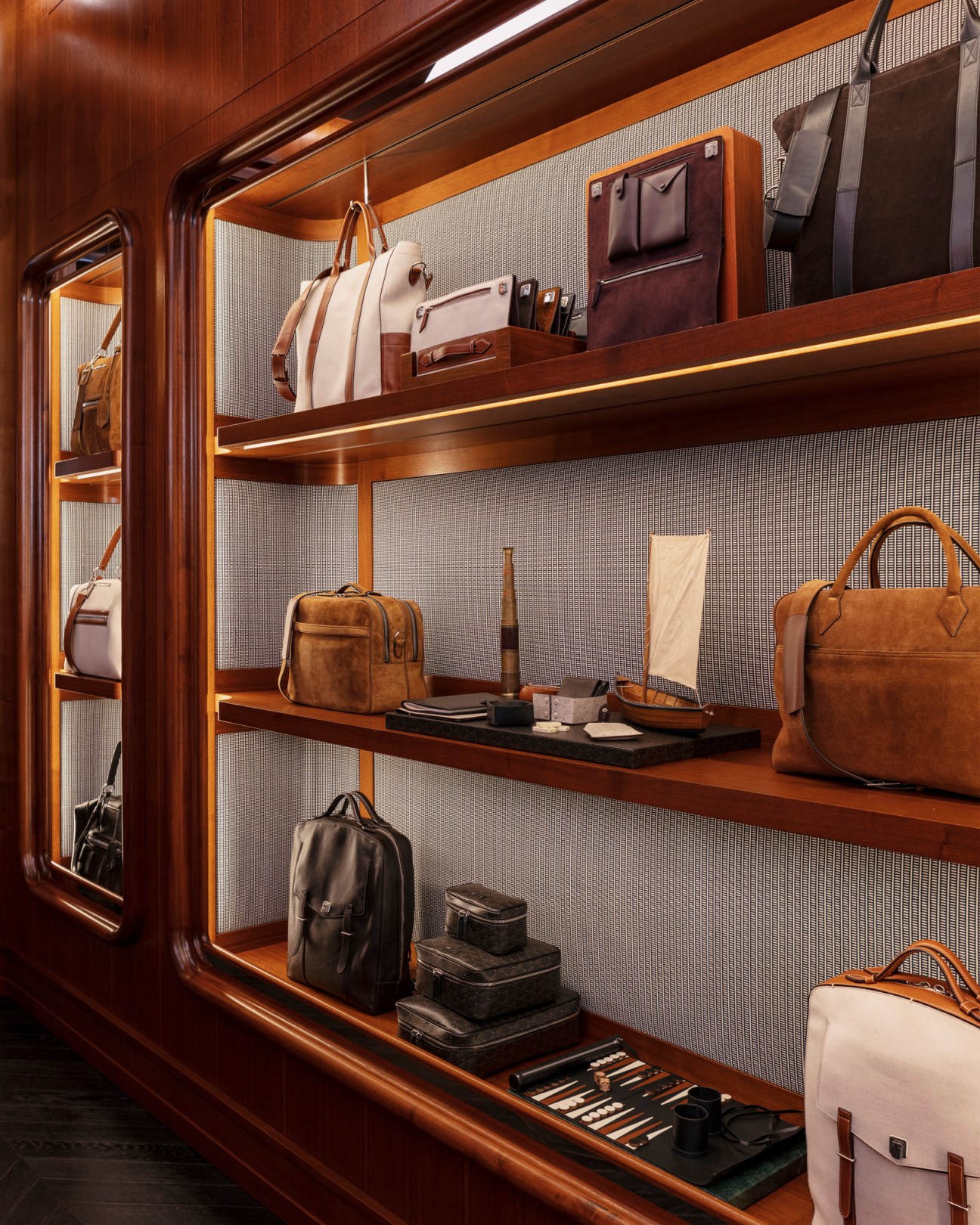 Métier London leather goods displayed in boutique interior