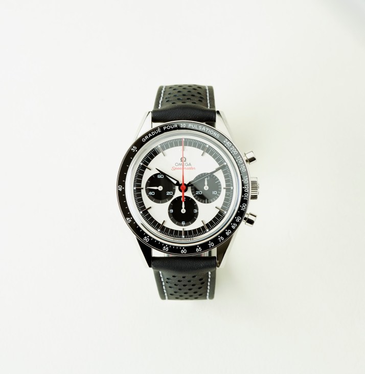 Omega Speedmaster Moonwatch CK2998 limited edition chronograph with white dial, black subdials, and black leather strap